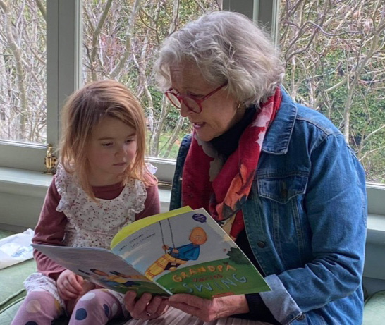 Helen and Mathilda enjoy a story together - Storylines